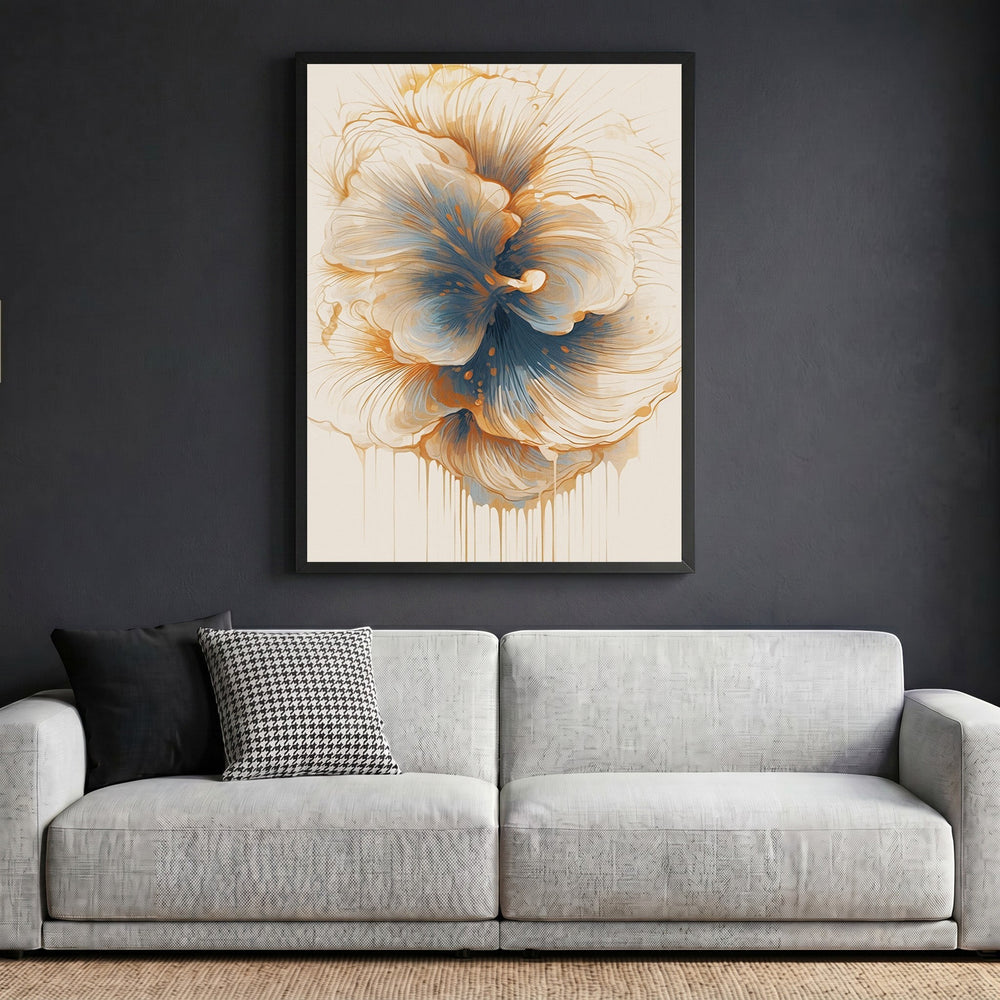 Wadi Home abstract floral wall art print with cream, blue, and amber tones in a black frame above a grey sofa.