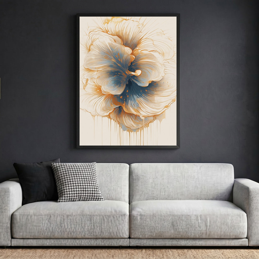 Wadi Home abstract floral wall art print with cream, blue, and amber tones in a black frame above a grey sofa.