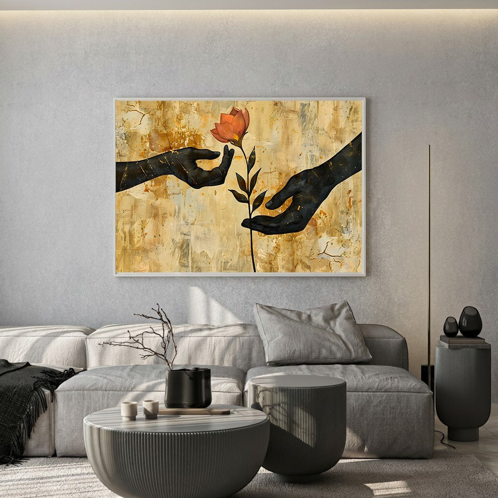 Wadi Home abstract wall art featuring black silhouettes of hands reaching for a flower on a textured gold background.
