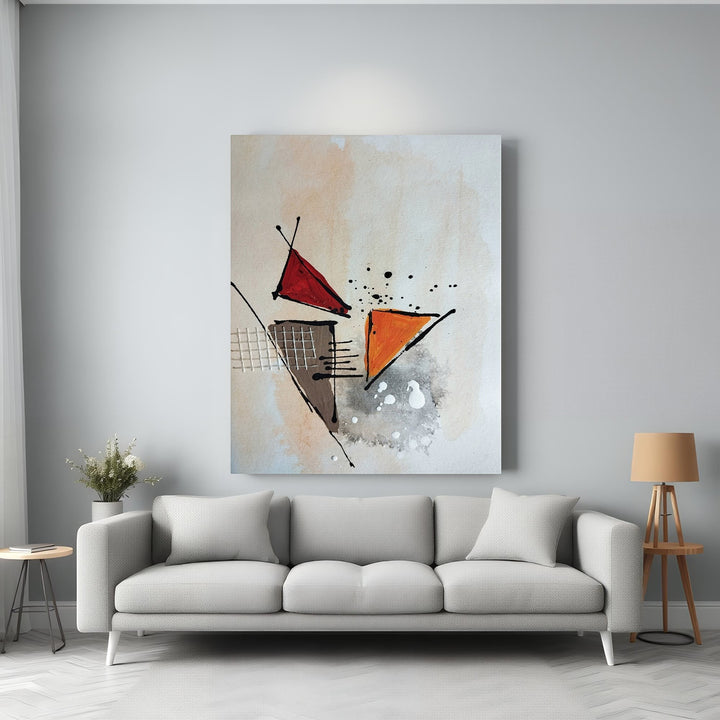 Wadi Home abstract geometric canvas art with red and orange triangles, textured background, and black accents.