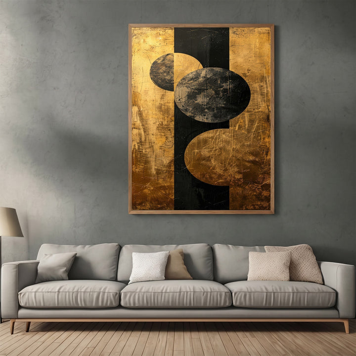 Wadi Home abstract geometric canvas print with black and metallic gold circles and lines in a modern living room