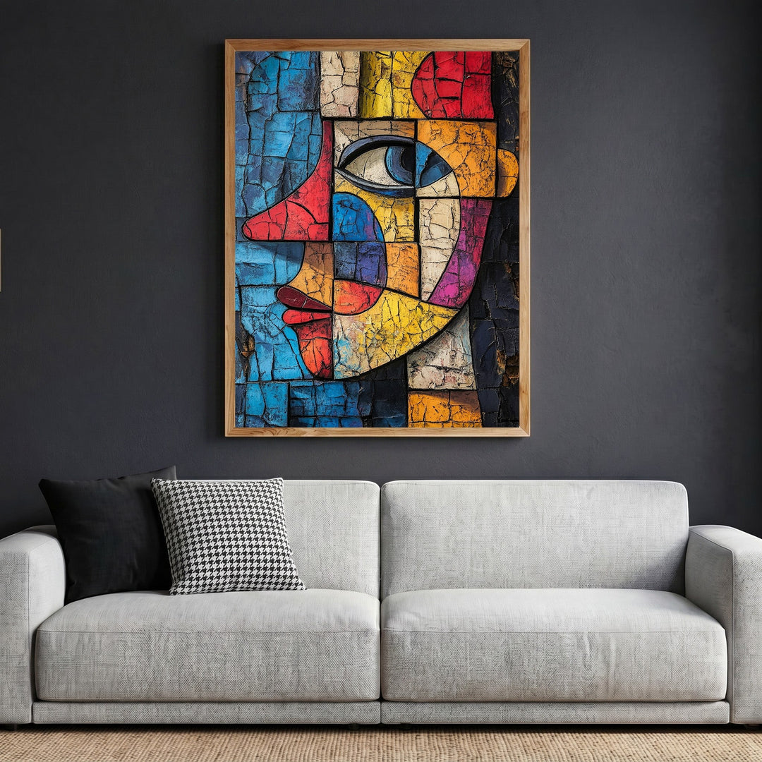Wadi Home abstract geometric face wall art with a cracked texture finish in a wooden frame above a modern sofa.