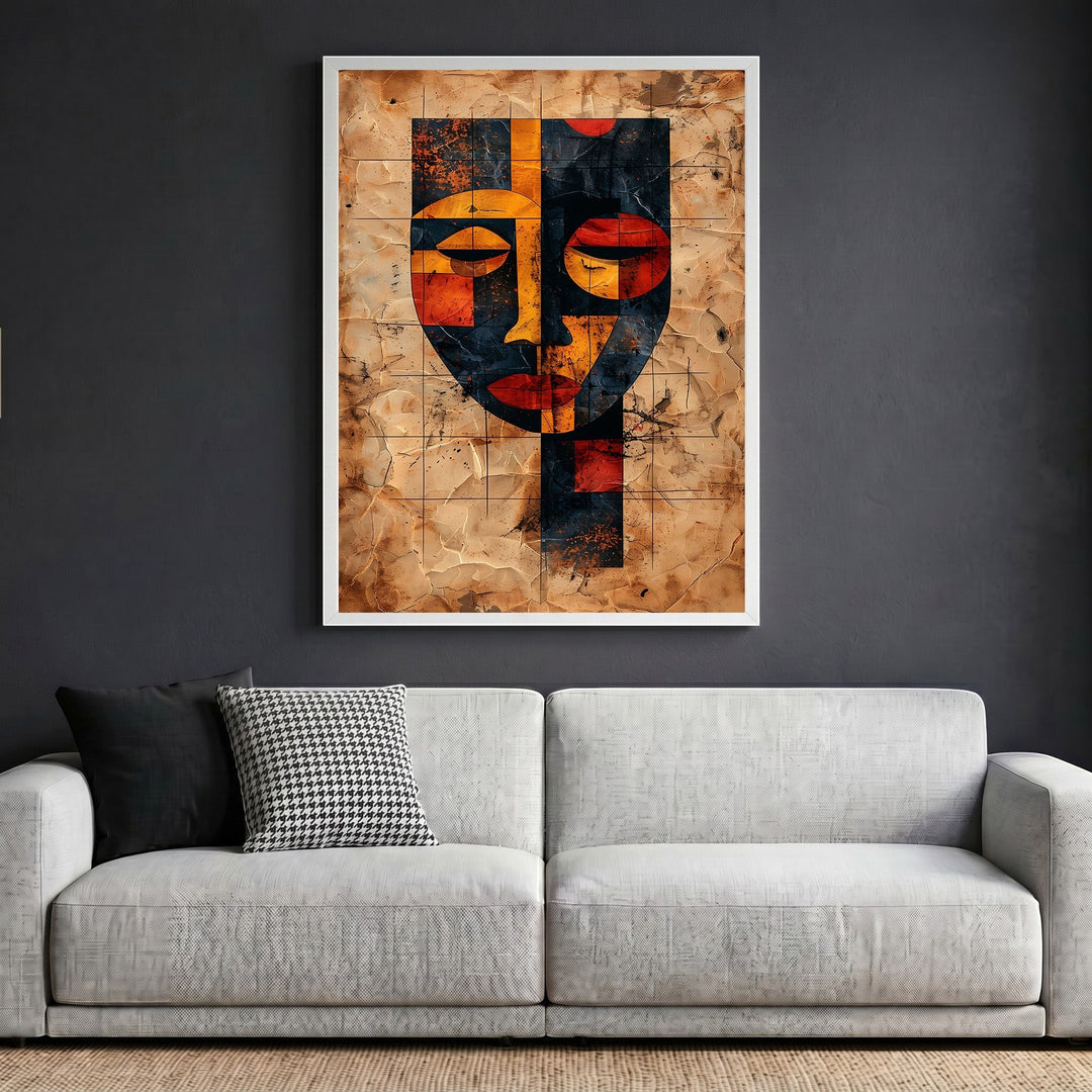 Wadi Home abstract geometric face wall art print with earthy tones and parchment texture hanging above a modern sofa.