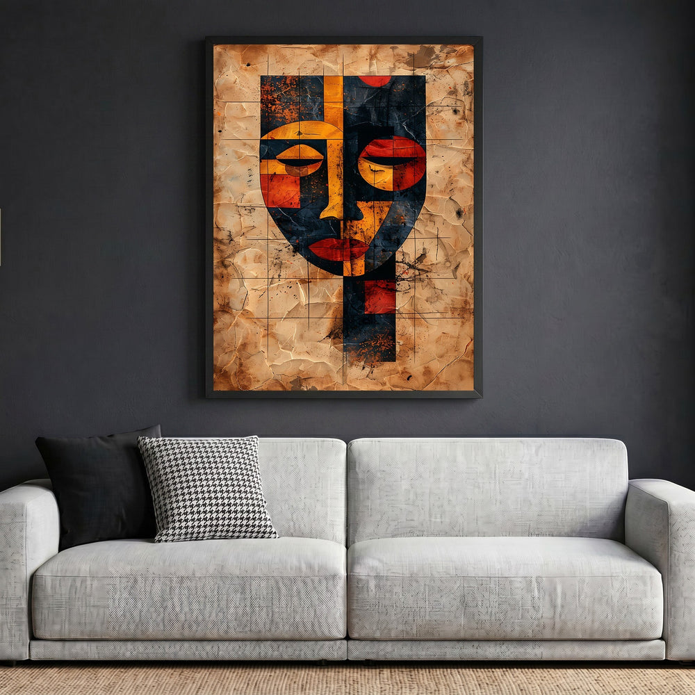 Wadi Home abstract geometric face wall art print in black frame hanging above a modern white sofa in a living room.