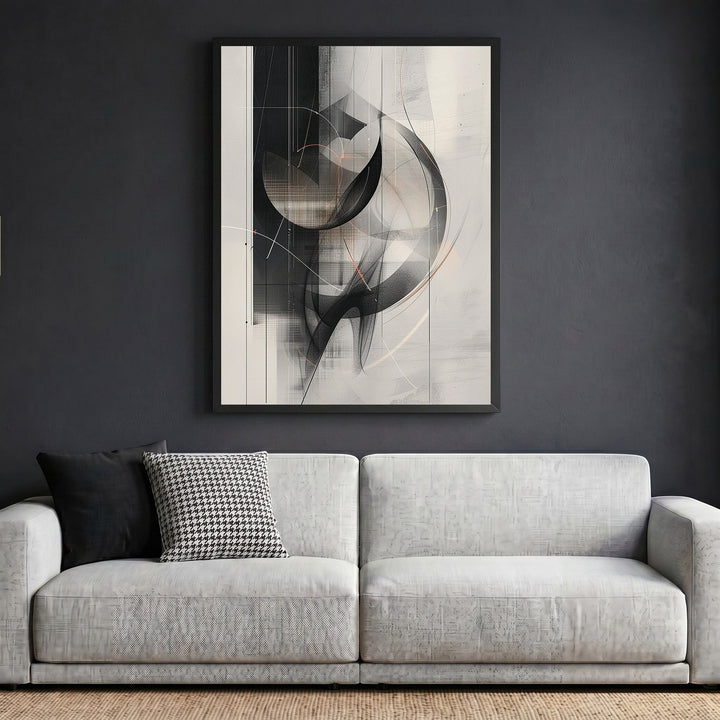 Wadi Home abstract geometric framed wall art in black and grey hanging above a modern white sofa.