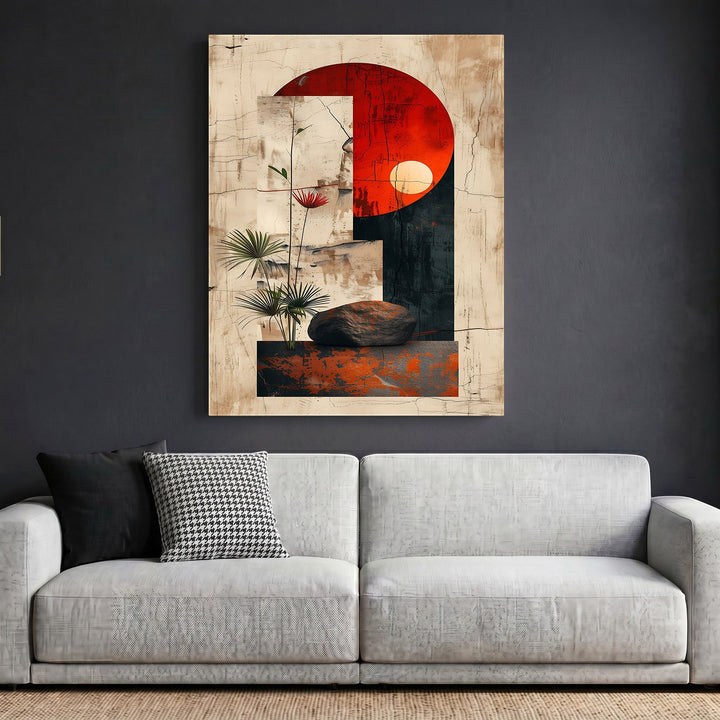 Wadi Home abstract geometric wall art with a bold red sun motif and botanical accents hanging above a grey sofa.