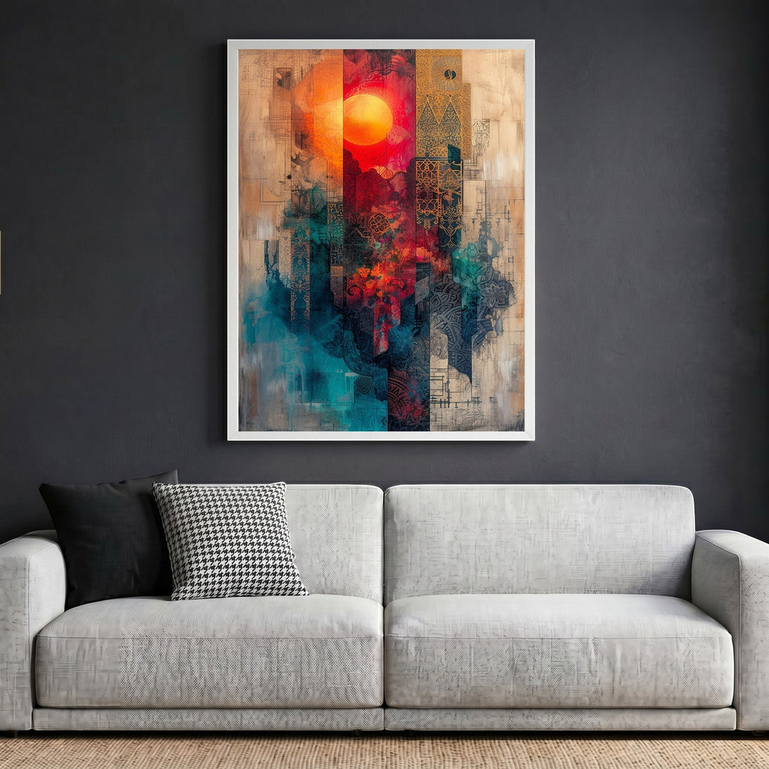 Wadi Home abstract geometric framed canvas wall art with sun motif in red and teal tones above a modern sofa.