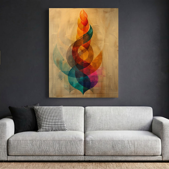 Wadi Home abstract geometric framed wall art with vibrant spiraling colors hanging above a modern grey sofa.