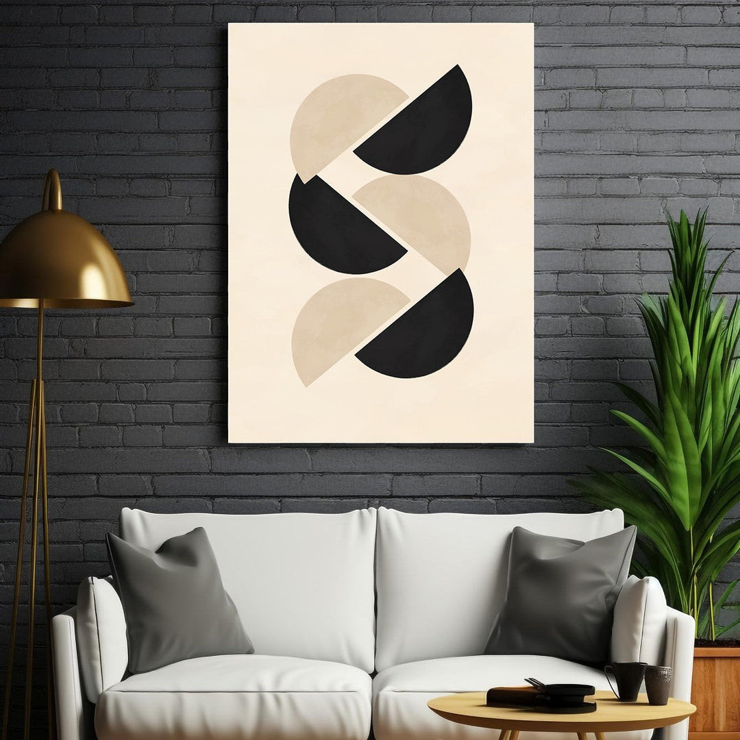 Wadi Home abstract geometric wall art with interlocking black and beige half circles on a cream background.