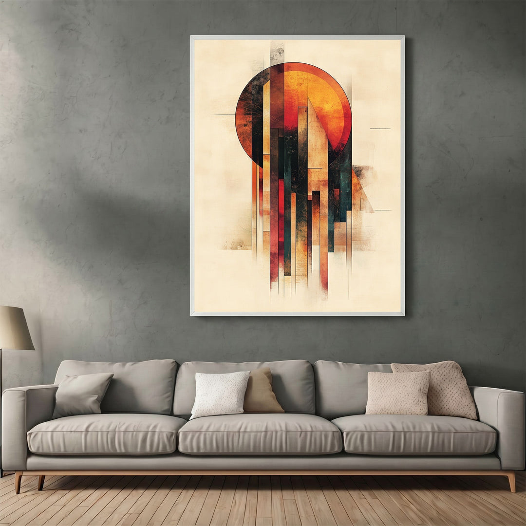 Wadi Home abstract geometric sun wall art print with warm earthy tones hanging above a modern grey sofa in a living room