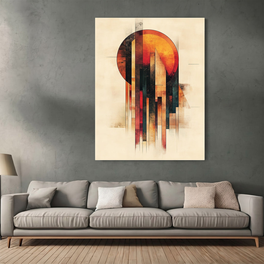 Wadi Home abstract geometric sun wall art print with warm earthy tones hanging above a modern grey sofa in a living room