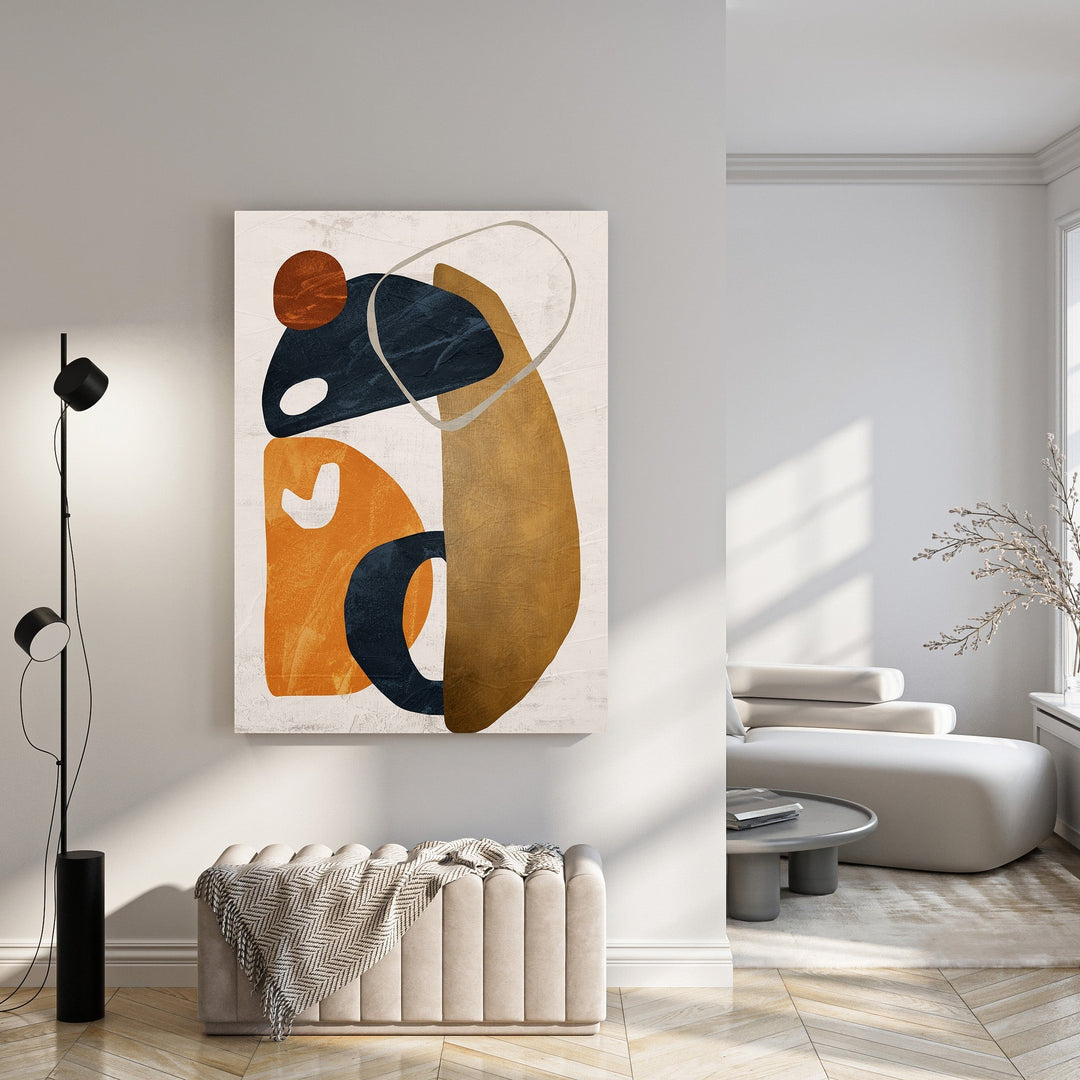 Wadi Home abstract geometric wall art with ochre, navy, and burnt orange organic shapes on textured background.