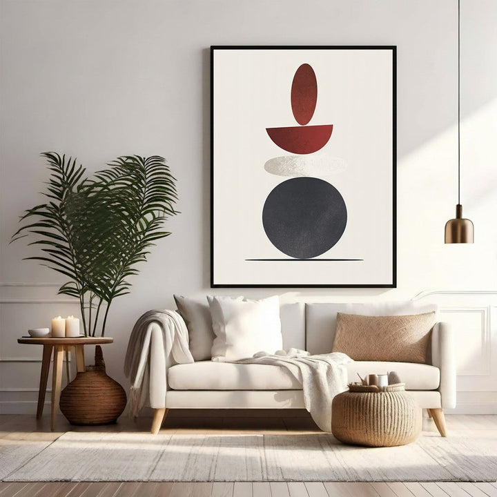 Wadi Home abstract geometric wall art with stacked red, grey, and cream shapes in a modern living room.