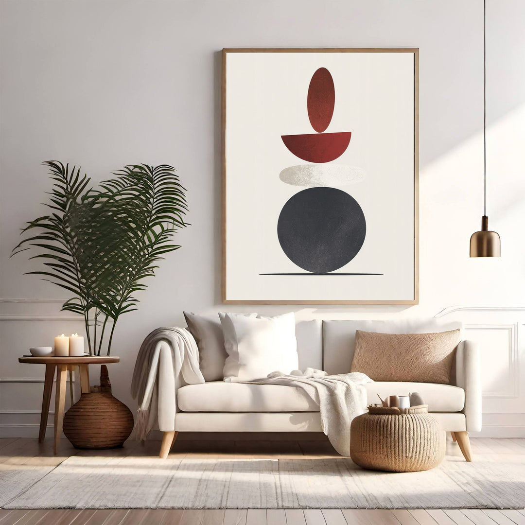 Wadi Home abstract geometric wall art with stacked red, grey, and black shapes in a modern living room.