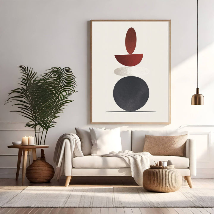 Wadi Home abstract geometric wall art with stacked red, grey, and black shapes in a modern living room.