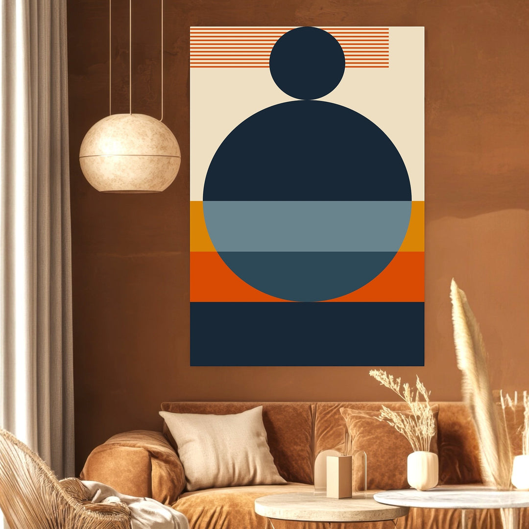 Wadi Home abstract geometric wall art print with navy, blue, and burnt orange circles on a warm brown living room wall.
