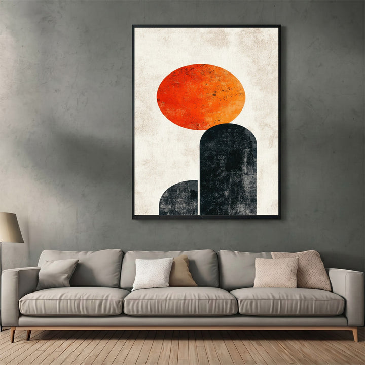 Wadi Home abstract geometric wall art with orange sun and charcoal arches in a modern living room setting