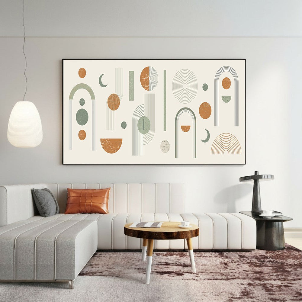 Wadi Home large abstract geometric wall art with sage green, terracotta, and cream shapes in a modern living room.