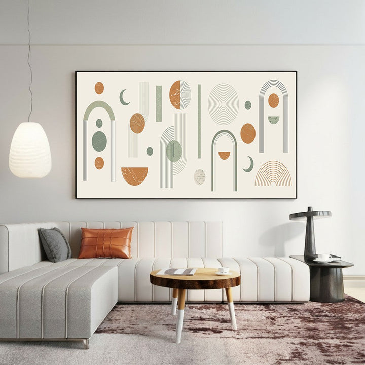 Wadi Home large abstract geometric wall art with sage green, terracotta, and cream shapes in a modern living room.