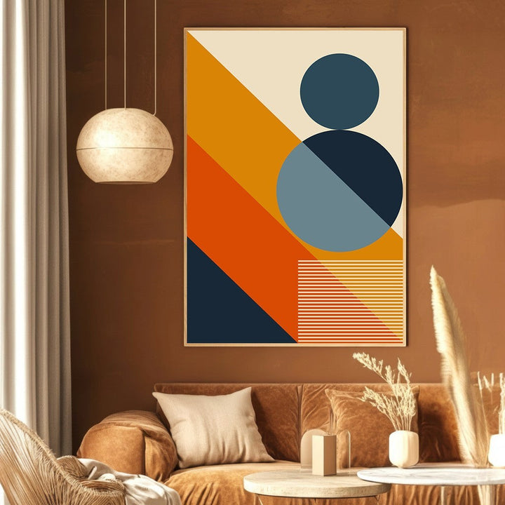 Wadi Home abstract geometric wall art print featuring navy, orange, and yellow shapes in a modern living room.