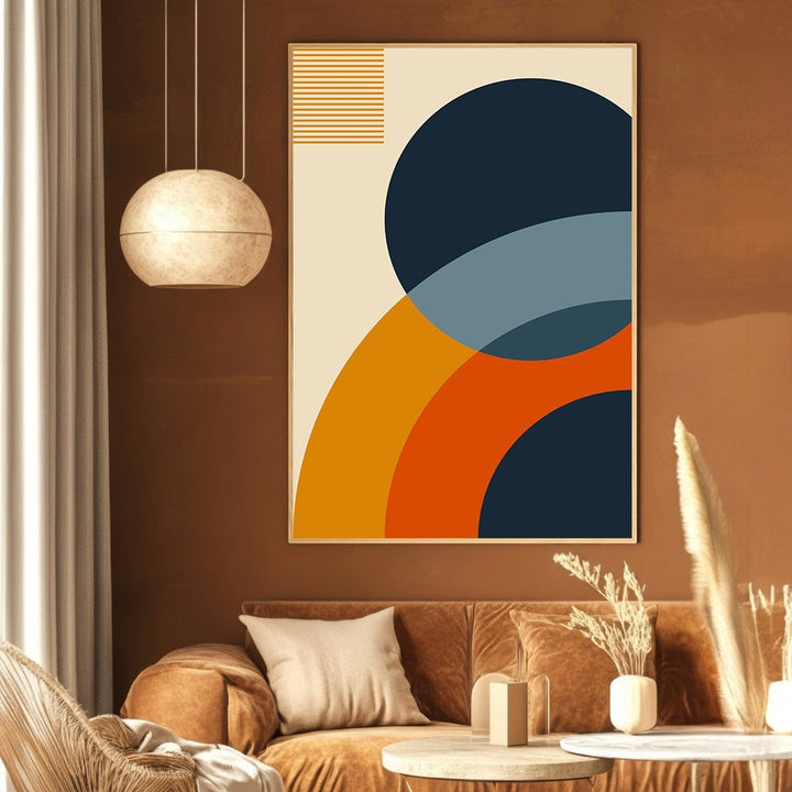 Wadi Home abstract geometric wall art print with navy, terracotta, and blue circles on a cream background in a room.