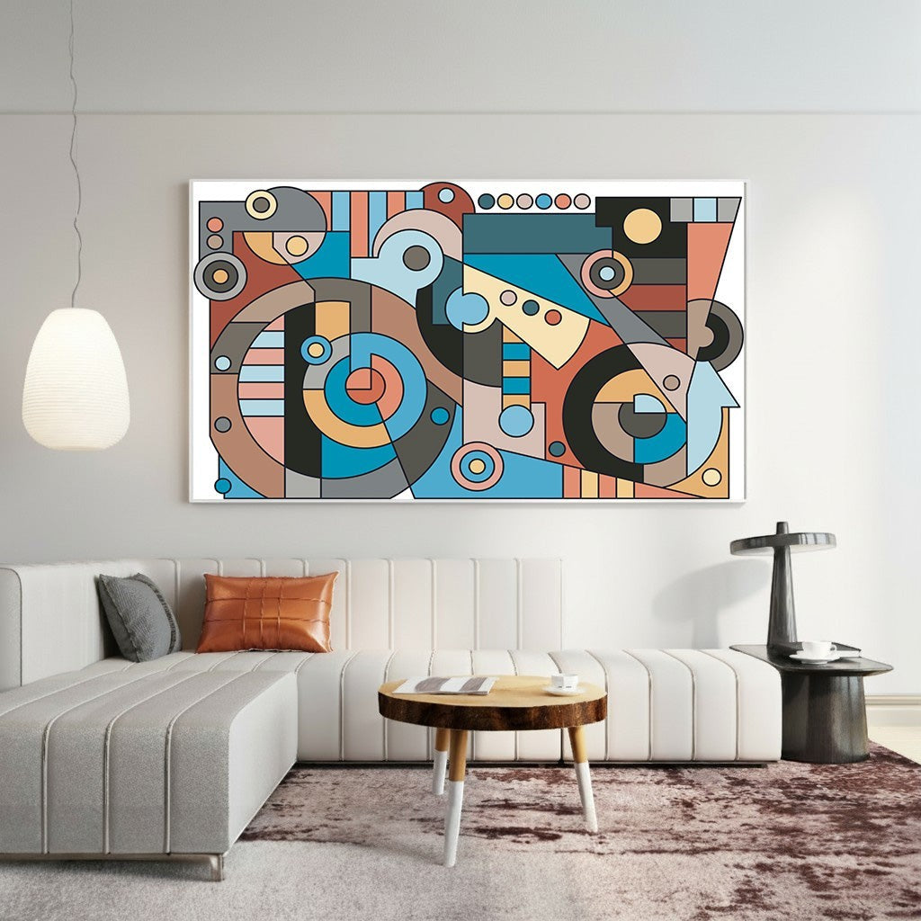Wadi Home abstract geometric wall art print with blue, terracotta, and pink shapes hanging above a modern sofa.