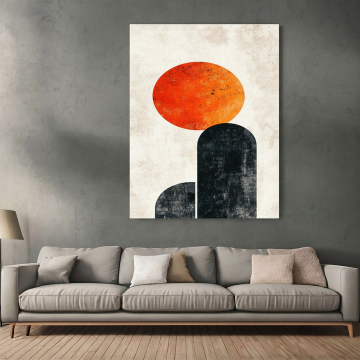 Wadi Home abstract geometric wall art featuring a textured orange sun over charcoal arches in a modern living room.