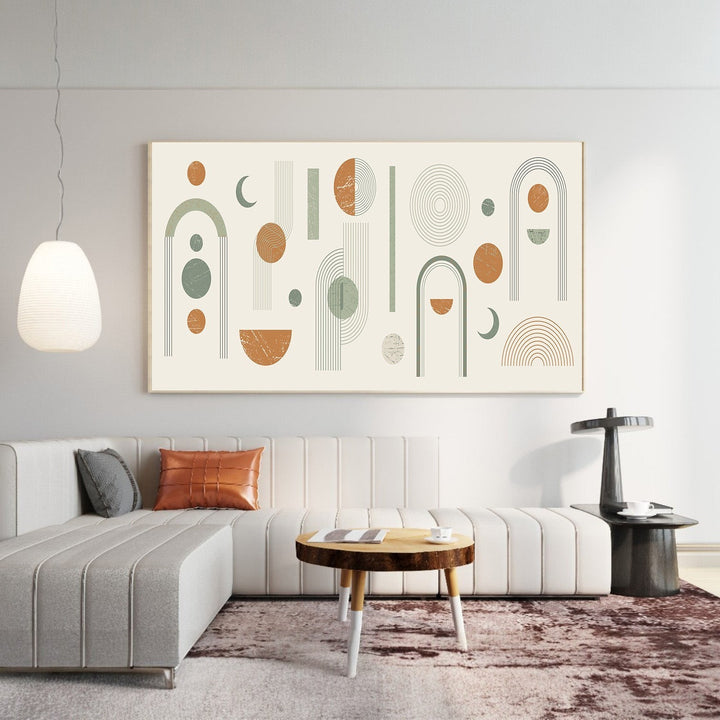 Wadi Home large abstract geometric wall art with sage green, terracotta, and cream shapes in a modern living room.