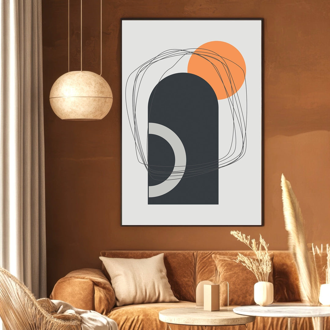 Wadi Home abstract geometric wall art print with charcoal arches and orange circle in a modern living room setting