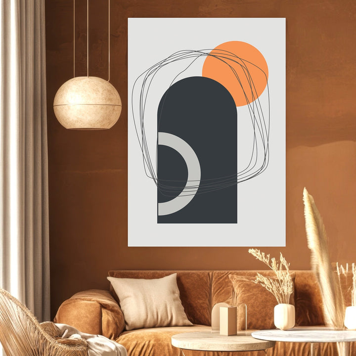Wadi Home abstract geometric wall art print featuring charcoal arches and an orange circle in a modern living room