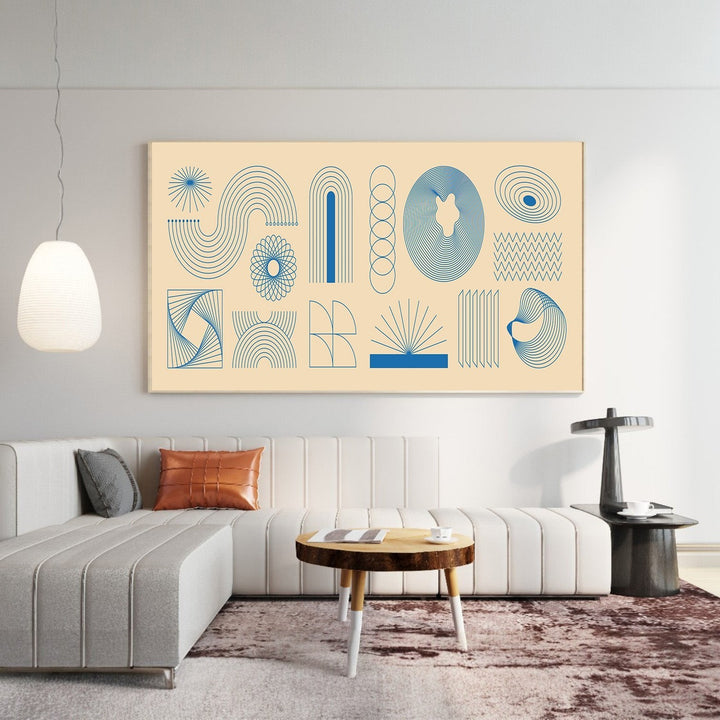 Wadi Home abstract geometric line art print with blue motifs on a cream background displayed above a modern sofa.