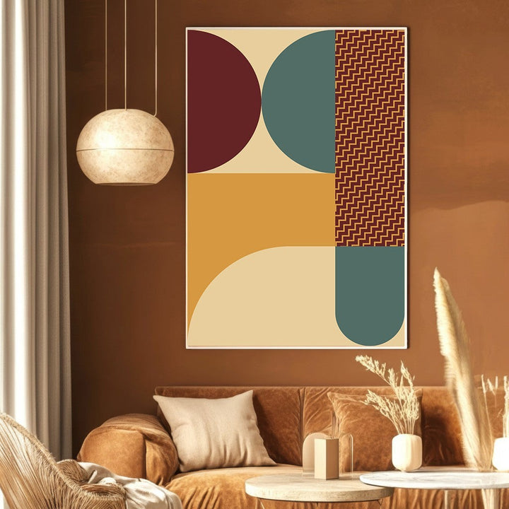 Wadi Home abstract geometric wall art print with burgundy, teal, and mustard shapes on a brown living room wall.