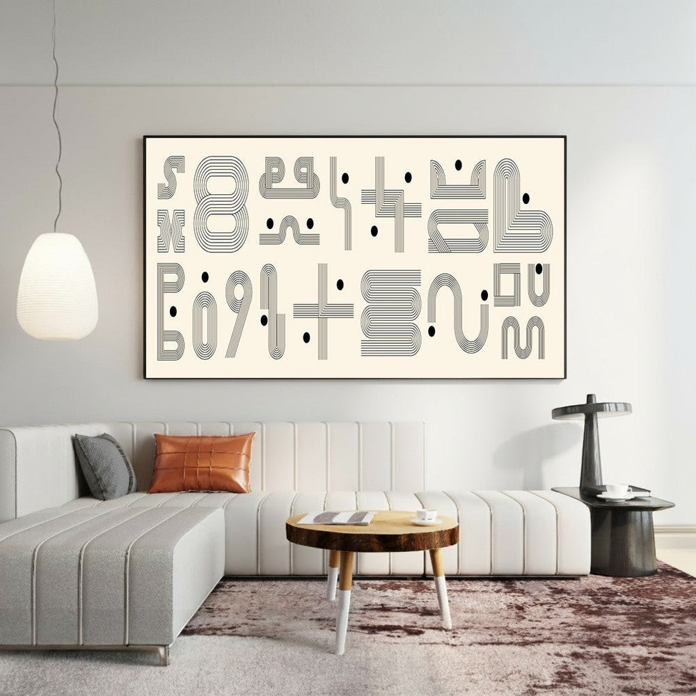 Wadi Home abstract geometric line art print with black patterns on a cream background hanging above a modern sofa.