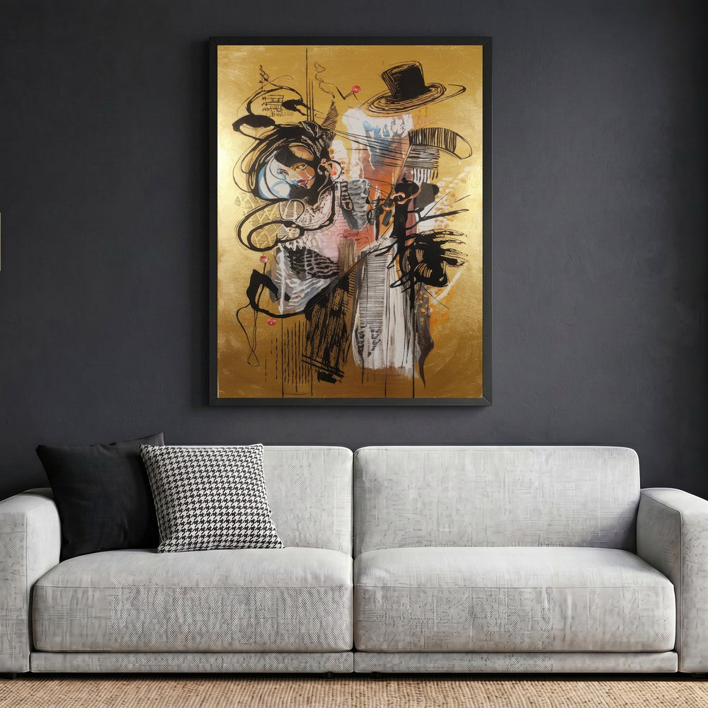 Wadi Home abstract expressionist framed wall art with gold background and black gestural lines above a grey sofa.
