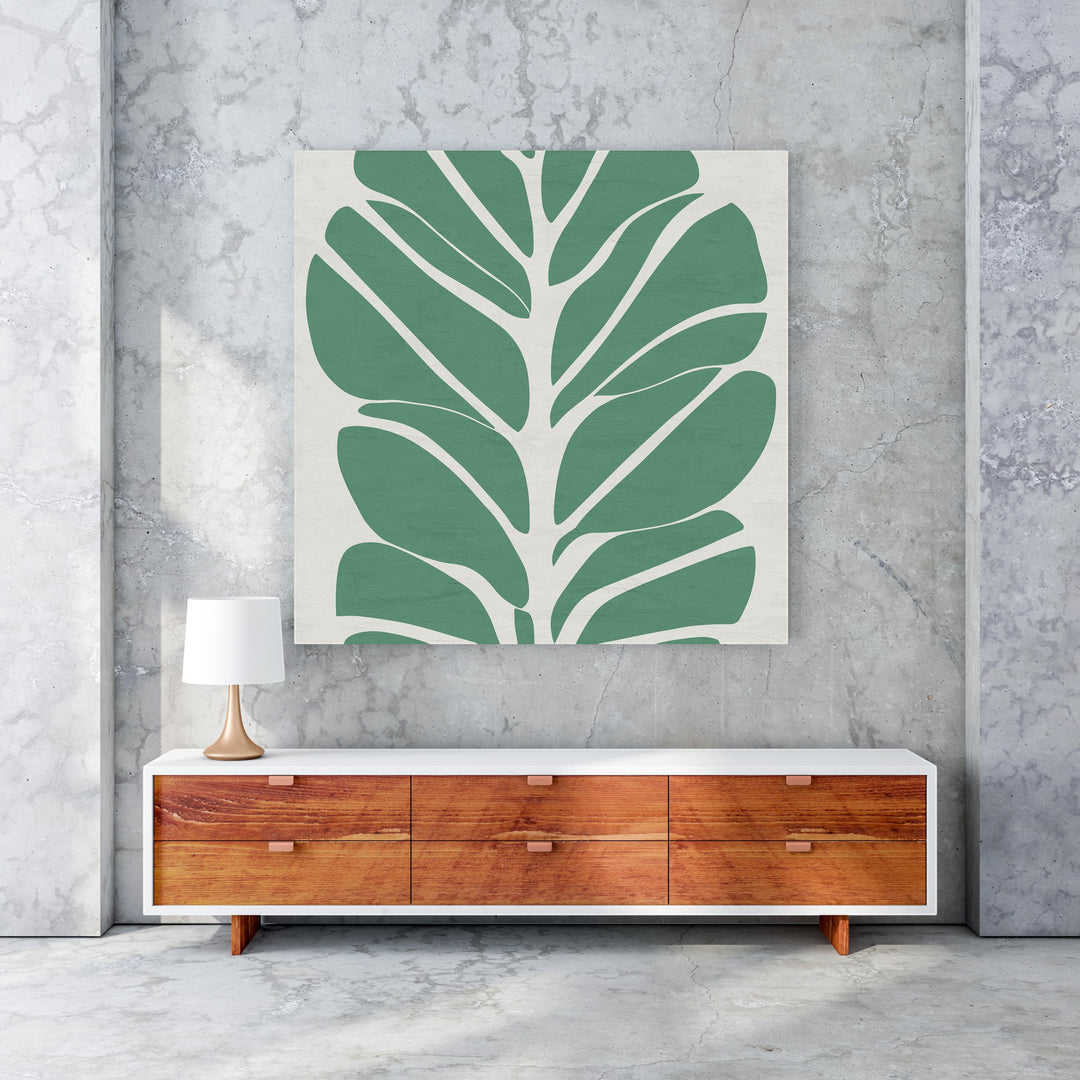 Wadi Home abstract green leaf wall art on a neutral background, minimalist botanical design.