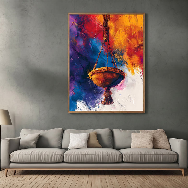 Wadi Home abstract hanging basket wall art print featuring vibrant orange, gold, purple, and blue brushstrokes in a frame