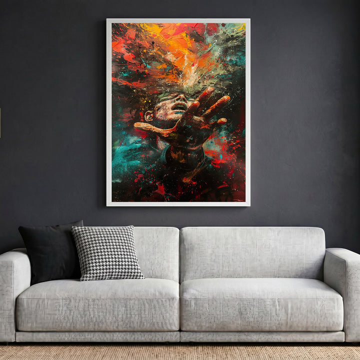 Wadi Home abstract expressionist human figure framed wall art with vibrant red and blue paint splashes above a sofa.