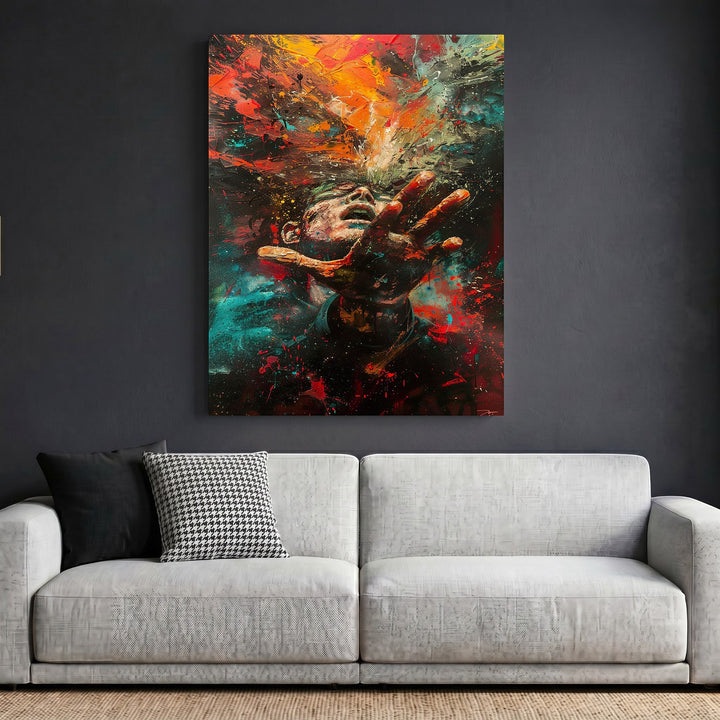 Wadi Home abstract expressionist human figure wall art featuring vibrant red, blue, and gold brushstrokes above a sofa.