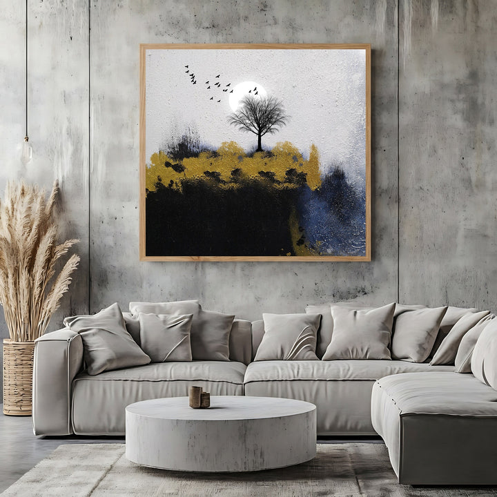 Wadi Home abstract landscape canvas wall art featuring a lone tree, moon, and gold accents in a modern living room.