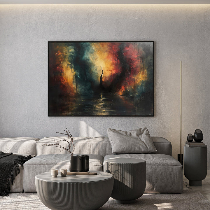 Wadi Home abstract landscape canvas print with teal and orange tones hanging above a modern grey sofa in a living room.
