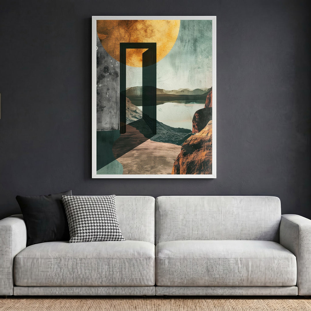 Wadi Home abstract landscape framed wall art with a golden sun and open doorway hanging above a modern grey sofa.