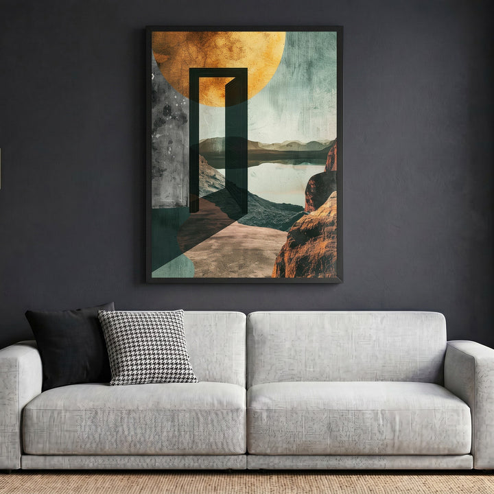 Wadi Home abstract landscape framed wall art featuring a golden sun, open doorway, and teal terrain above a grey sofa.
