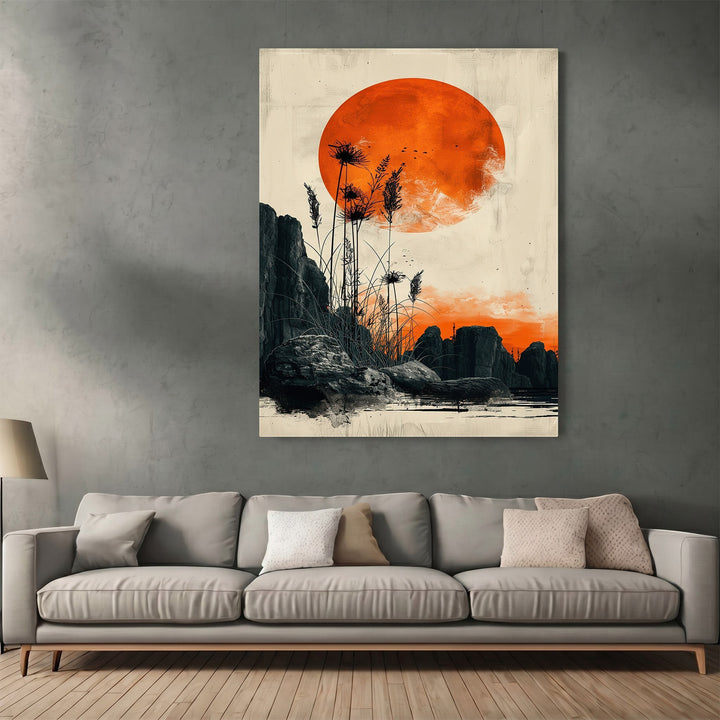 Wadi Home abstract landscape wall art featuring a large crimson sun, dark rock formations, and reeds above a sofa.