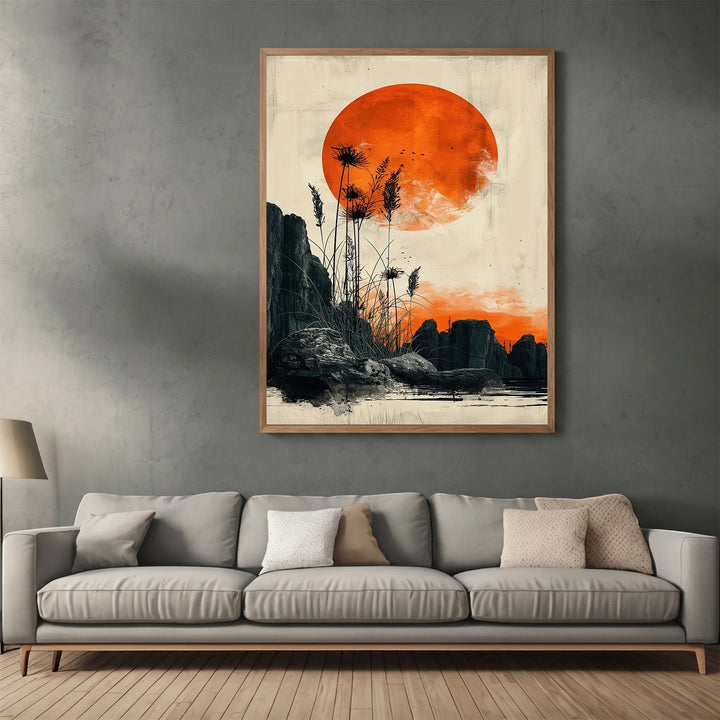 Wadi Home abstract landscape wall art featuring a large crimson sun, rock formations, and reeds in a wooden frame.