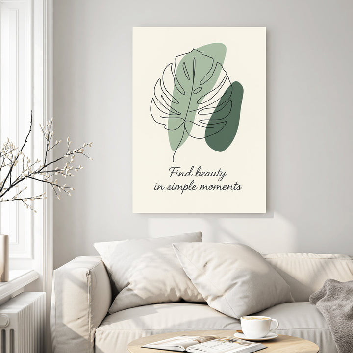 Wadi Home abstract monstera leaf line art with sage green shapes and quote "Find beauty in simple moments" on cream background.