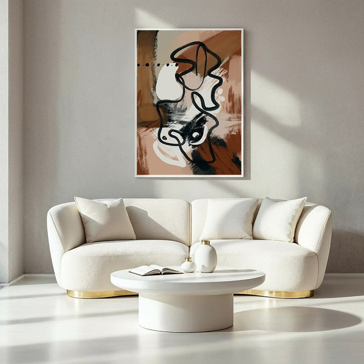 Wadi Home abstract line art canvas print in earthy tones with black lines, displayed above a cream sofa.