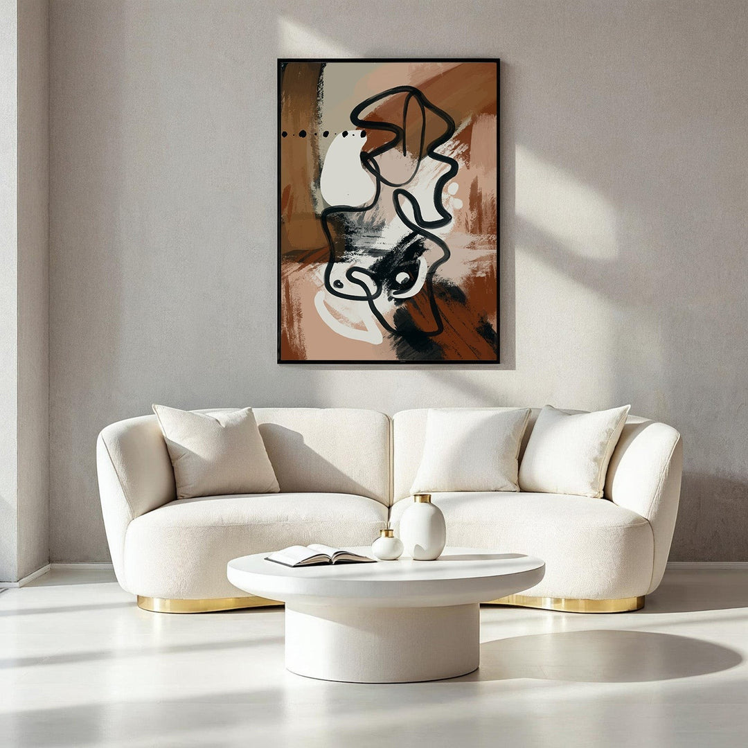 Wadi Home abstract line art canvas print in earthy tones with black and white accents, framed in black.
