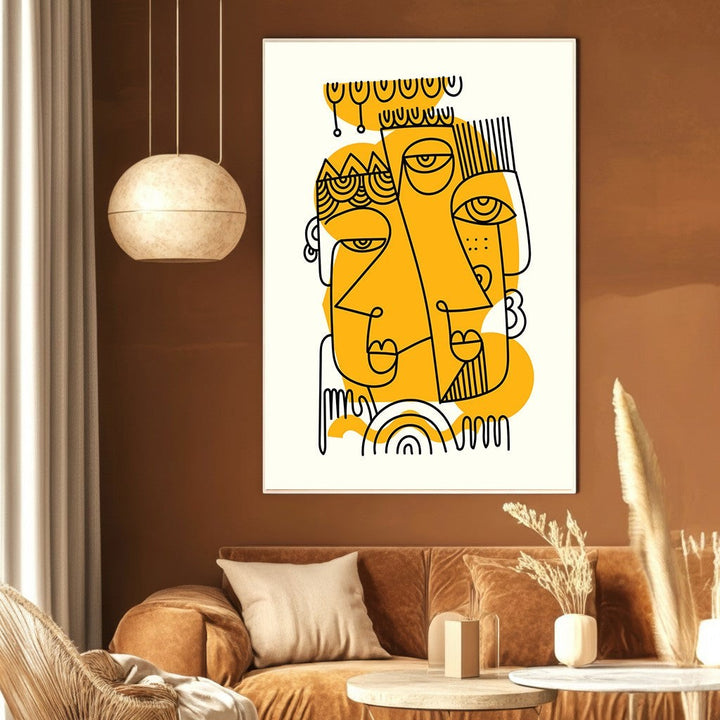 Wadi Home abstract line art print featuring black faces on mustard yellow accents displayed in a modern living room.