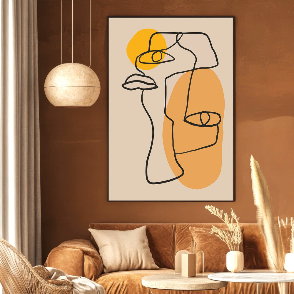 Wadi Home abstract line art face print with ochre and yellow accents in a modern living room