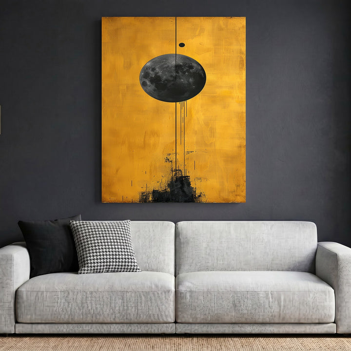 Wadi Home abstract celestial moon wall art print with a textured black lunar sphere on a vibrant golden-yellow background.